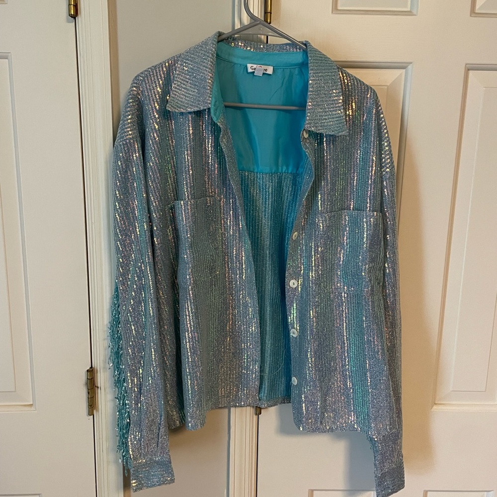 Blue sequin button up top.